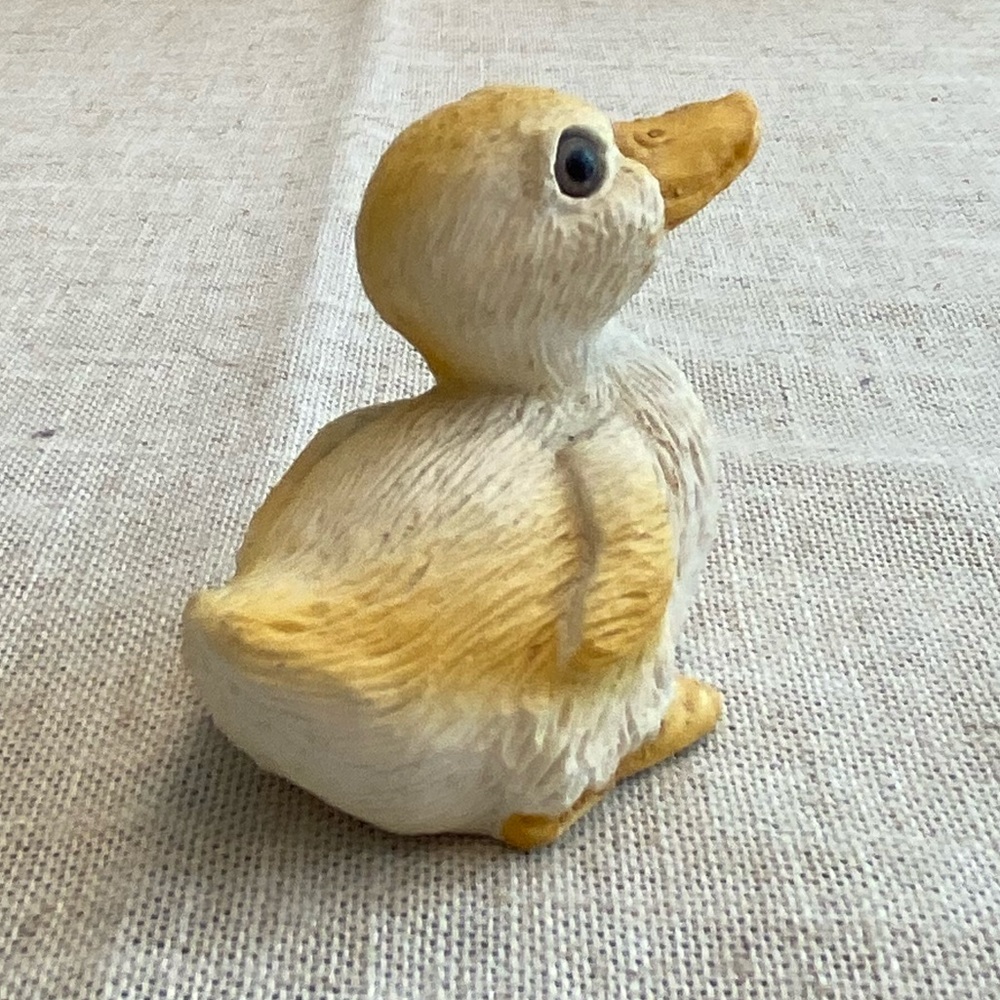 Resin yellow and white baby chick.